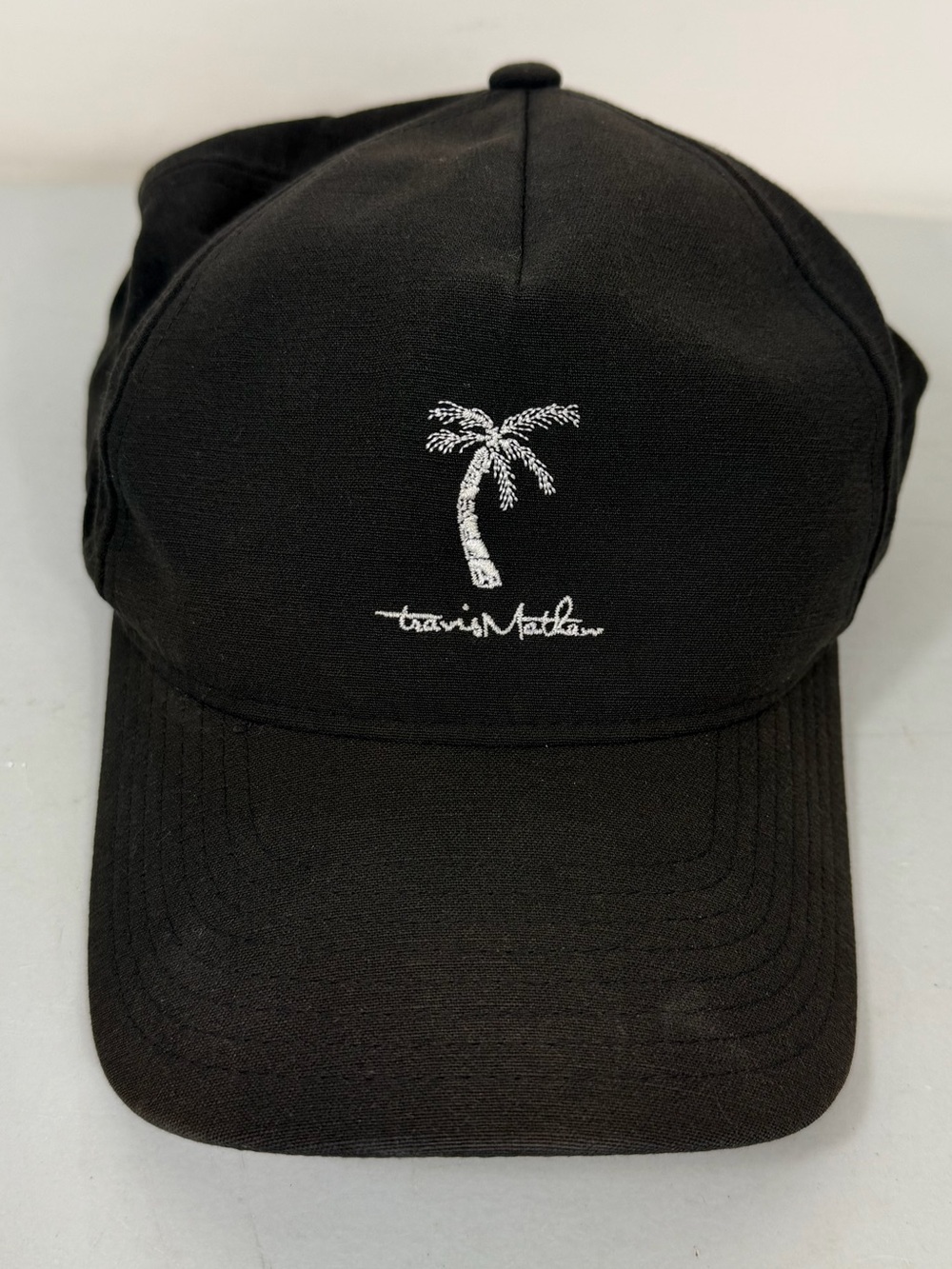 Travis Mathew Black Baseball Cap with White Palm Tree Embroidery